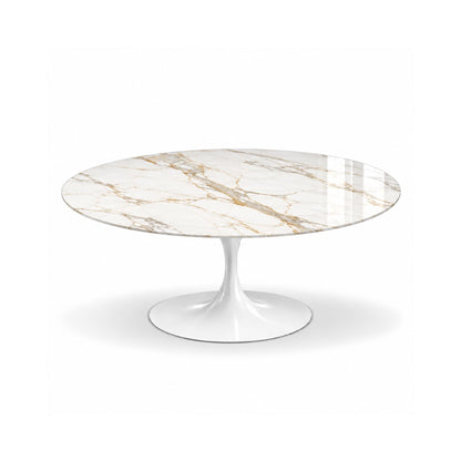 Tulip round coffee table featuring a polished Calacatta Gold marble tabletop with elegant gold and grey veining and a white tulip pedestal base, ideal for luxury modern and contemporary living rooms.