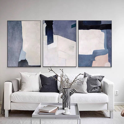 A set of 3 light blue abstract paintings on canvas