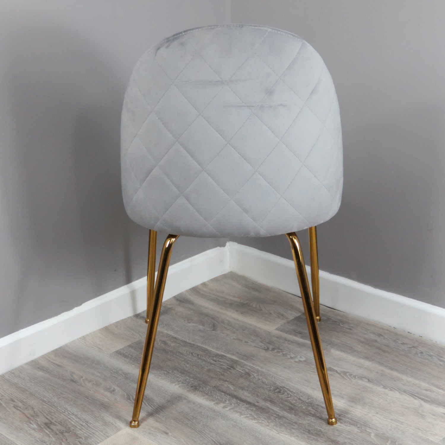 White chair with rose deals gold legs