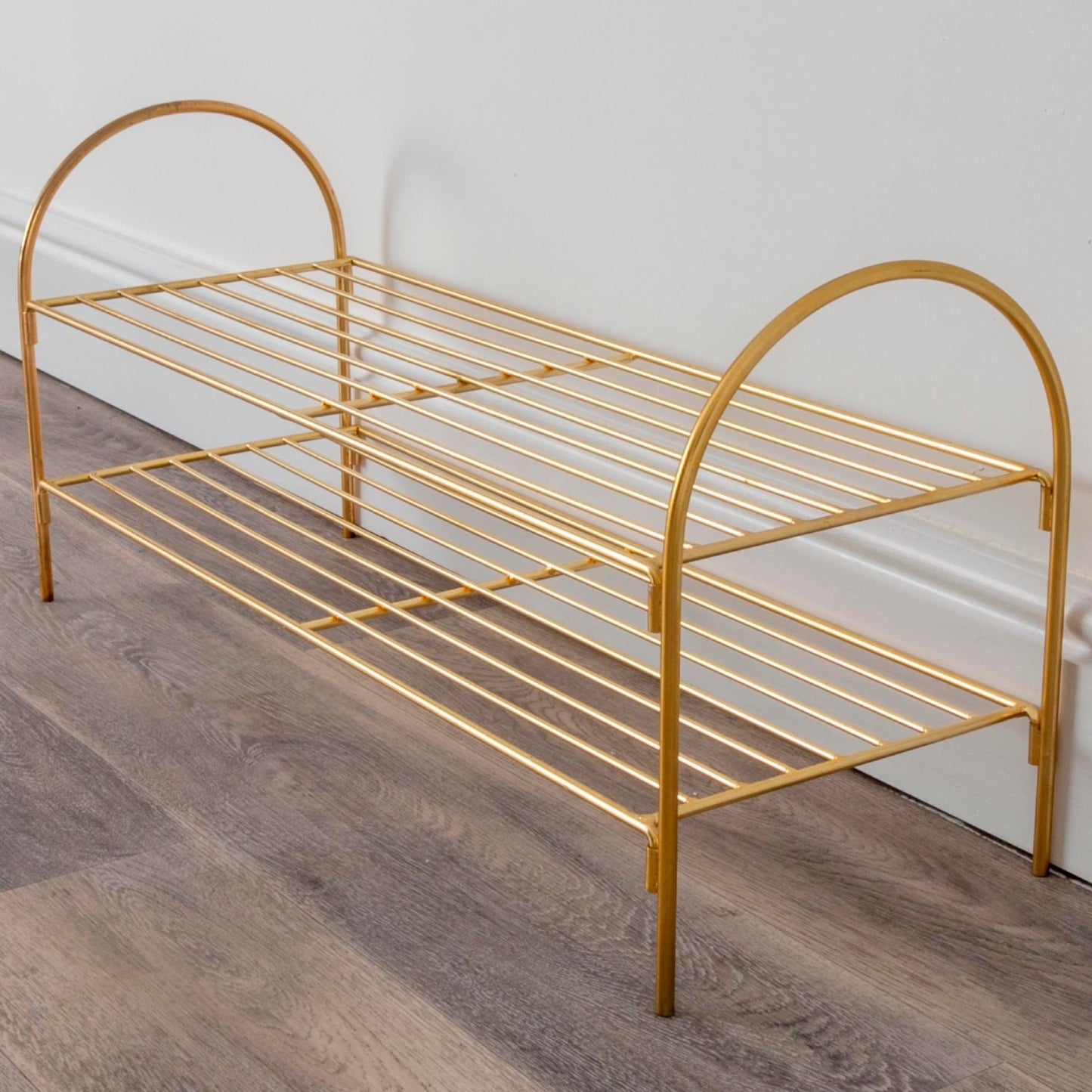 Gold shoe rack by Native