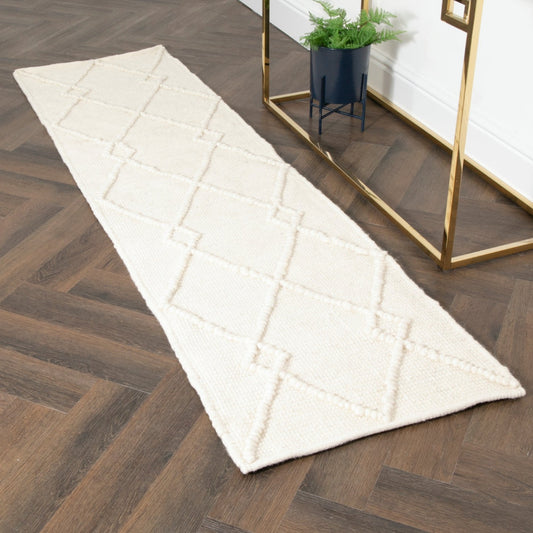 Cream diamond pattern wool rug by Native