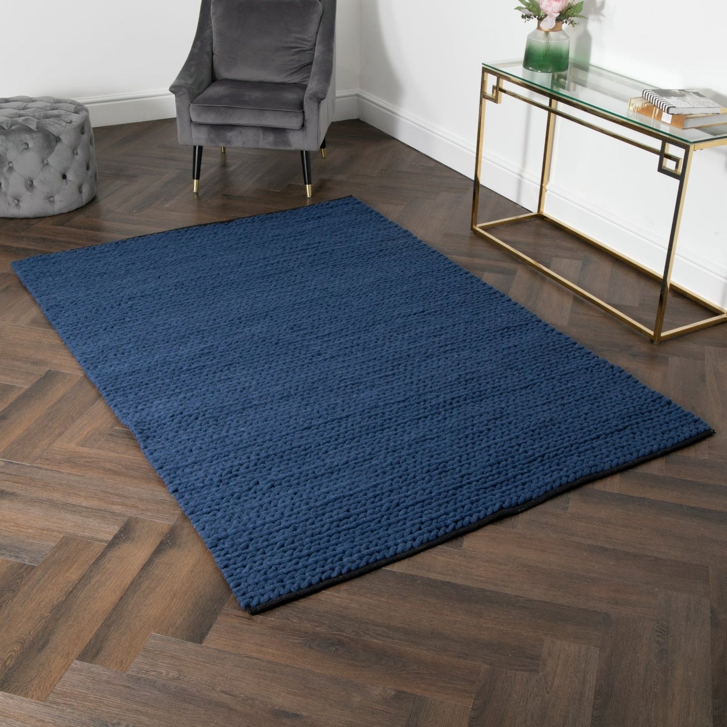 Navy knitted wool rug by Native