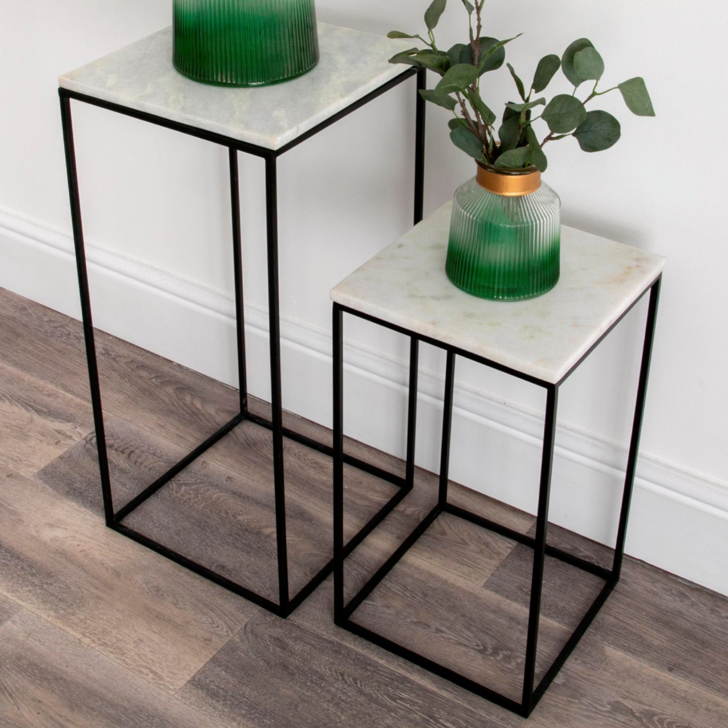 Set of two marble display tables by Native