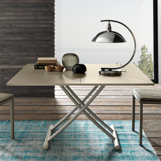 Altacom Bessy convertible coffee table raised to dining height with chairs in modern interior