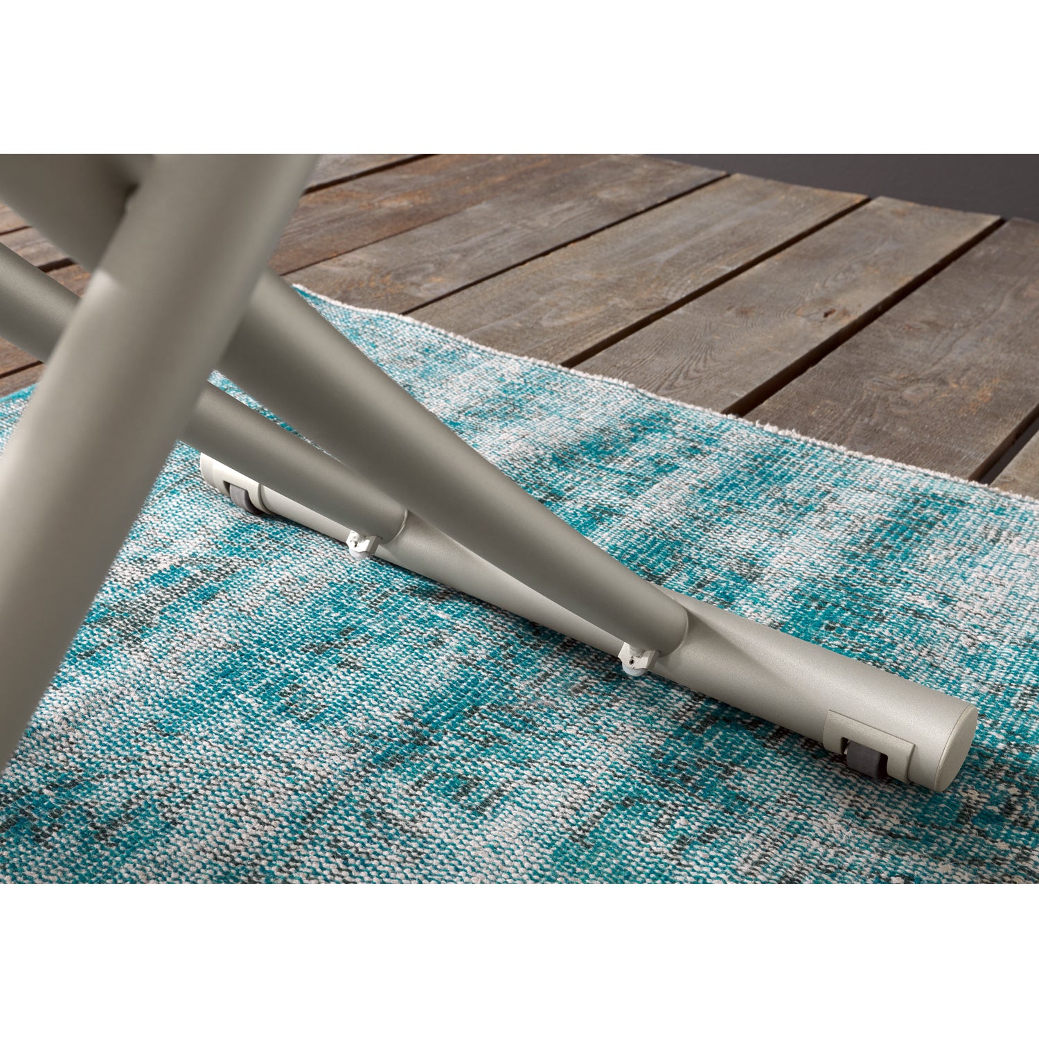 Altacom Bessy convertible table base detail with concealed wheels for easy movement