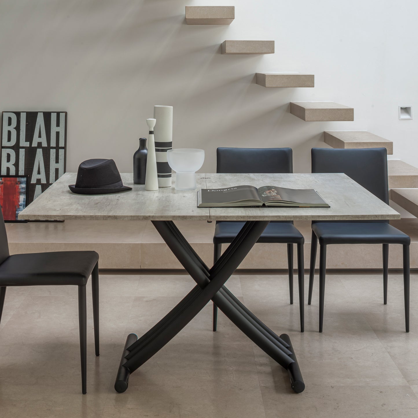 Altacom Fenice extendable dining table with cross metal base in modern interior setting
