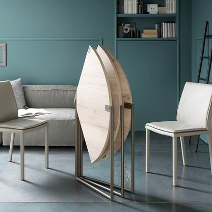 Altacom Icaro folding dining table in closed vertical position showing ultra slim space saving design