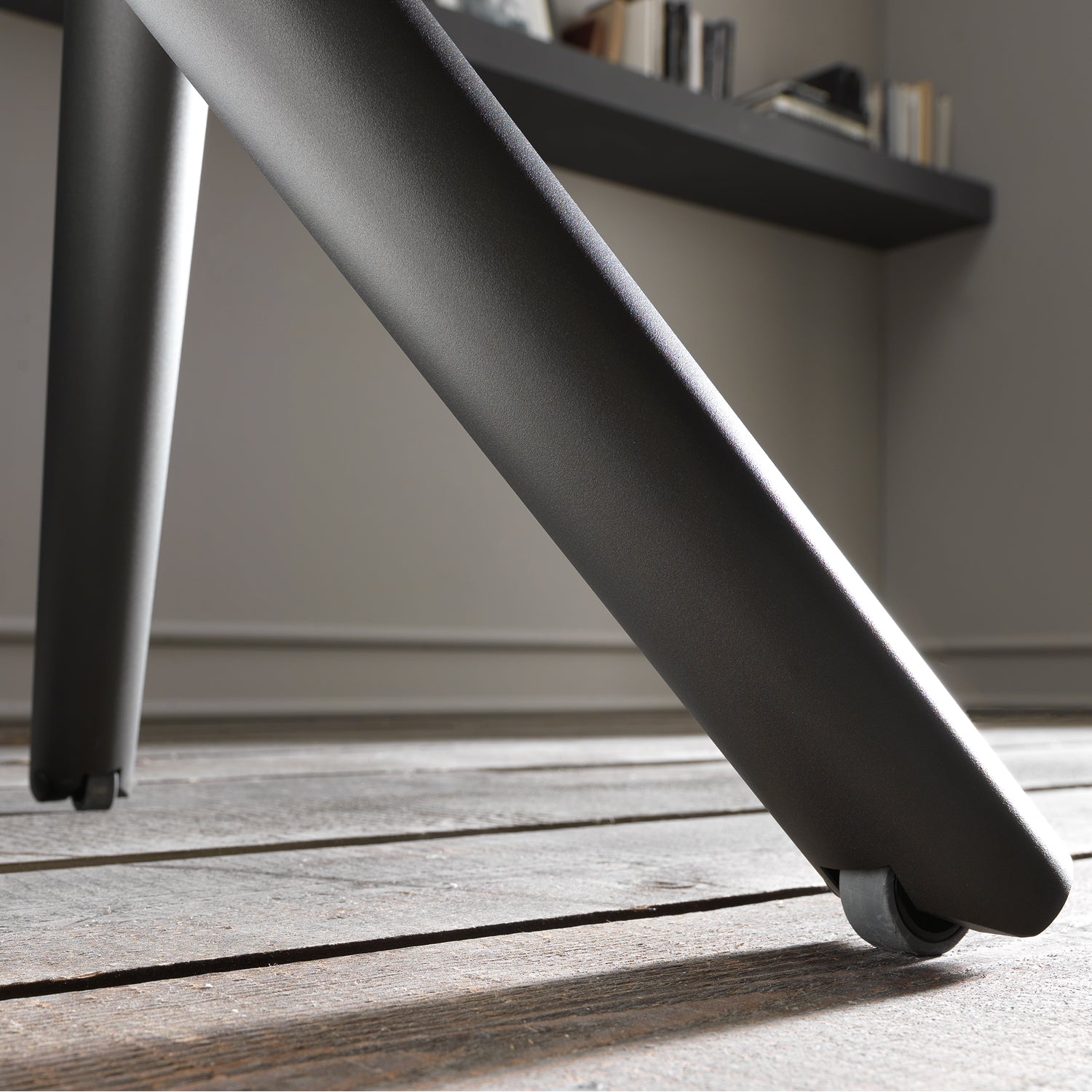 Altacom Levante transforming coffee table metal base detail with hidden wheels for easy movement