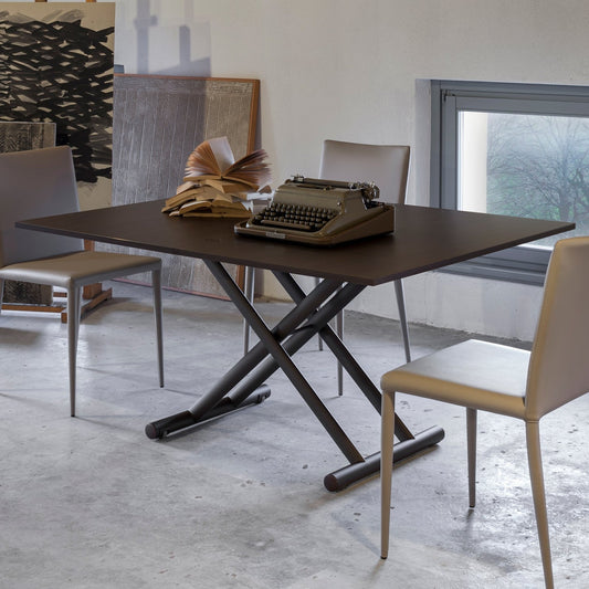 Altacom Universe convertible coffee table raised to dining height with chairs in modern interior