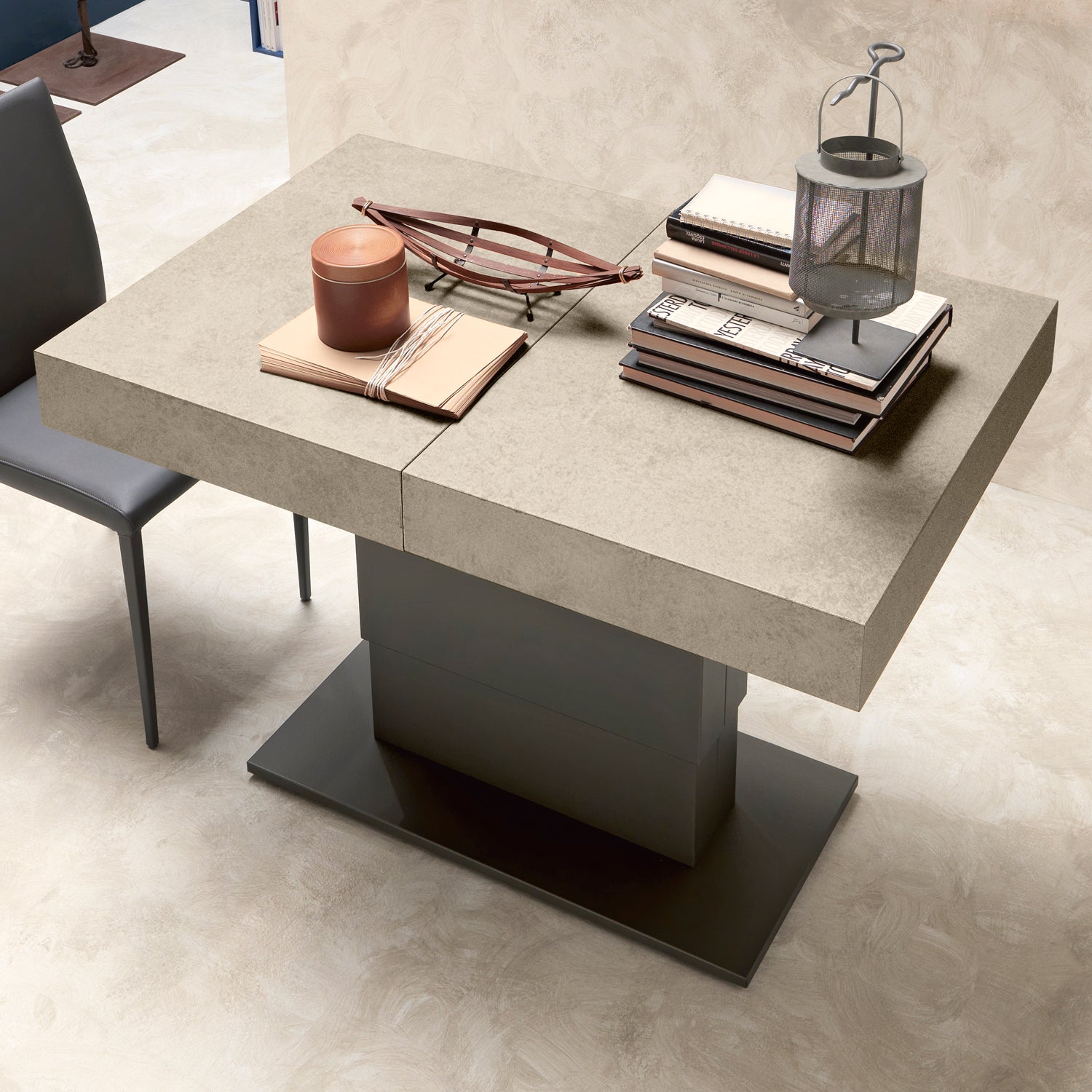 Ares Fold compact transforming coffee table in closed position with central pedestal base in modern interior