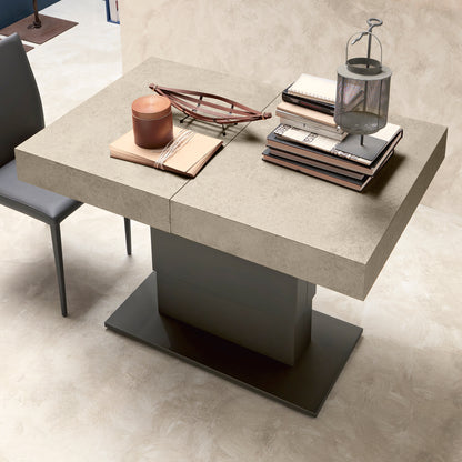 Ares Fold compact transforming coffee table in closed position with central pedestal base in modern interior