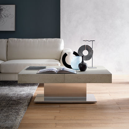 Ares Mega Altacom convertible table used as modern coffee table in living room with textured top and central base