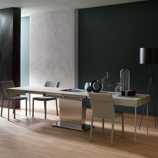 Ares Mega Altacom convertible table fully extended into large dining table seating multiple people with extension leaves