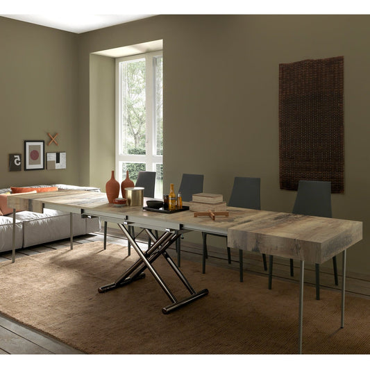 Assist convertible table by Altacom extended into large dining table with multiple leaves and metal support legs in modern living room