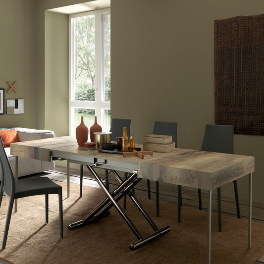 Assist convertible table by Altacom extended into large dining table with chairs showing multi person seating capacity