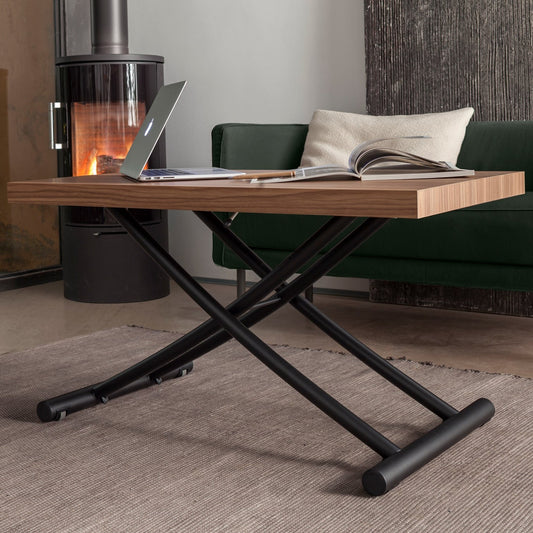 convertible coffee table raised to full height used as desk with adjustable metal base