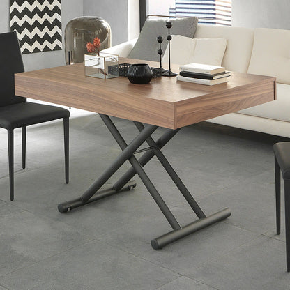 Febo convertible table by Altacom raised to dining height with chairs showing transformation from coffee table to dining setup