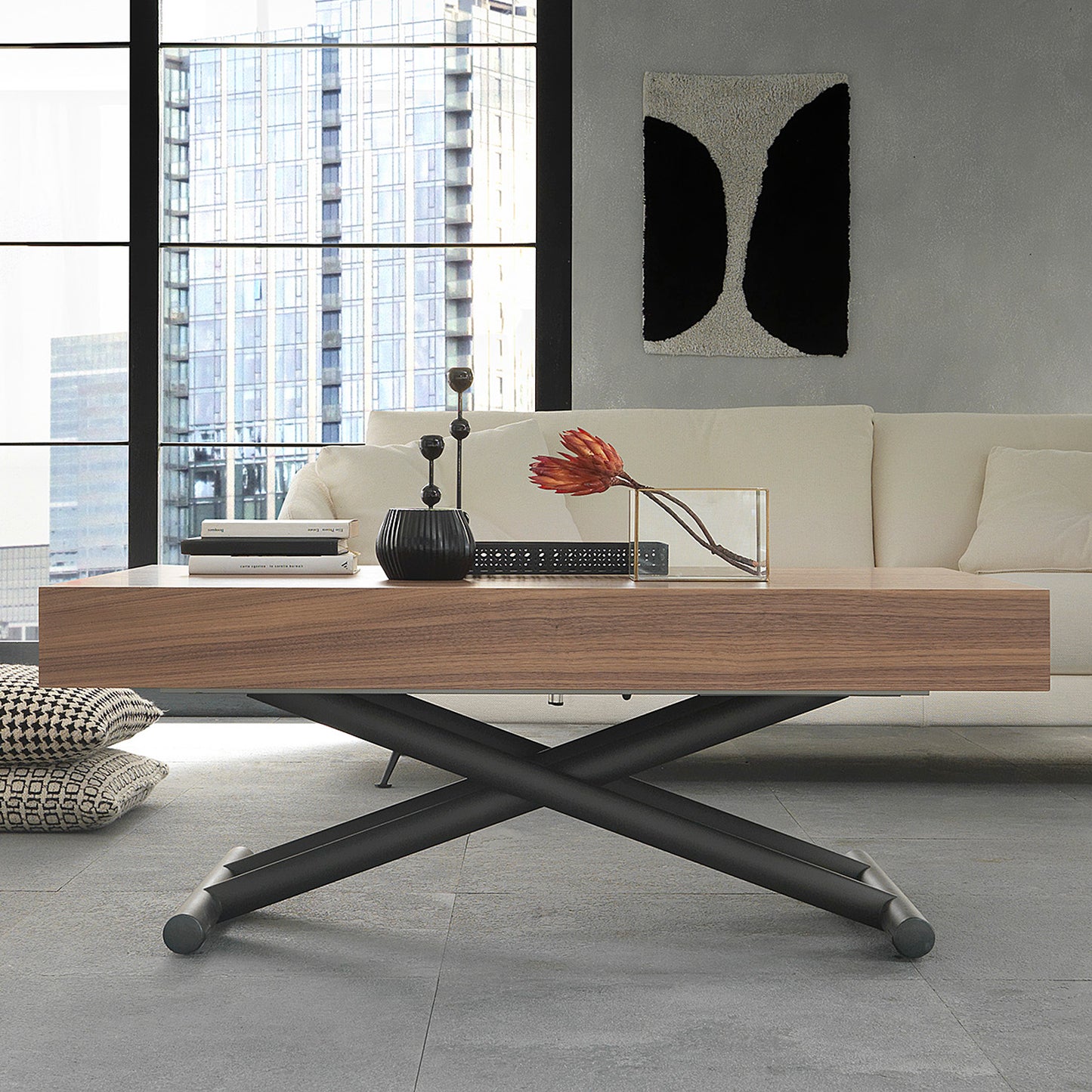 Febo convertible table by Altacom lifted to dining height showing gas lift scissor mechanism and metal base