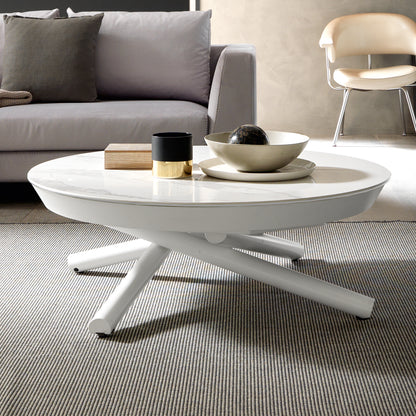 White Helios transforming coffee table by Altacom with marble-effect ceramic top and crossed metal base