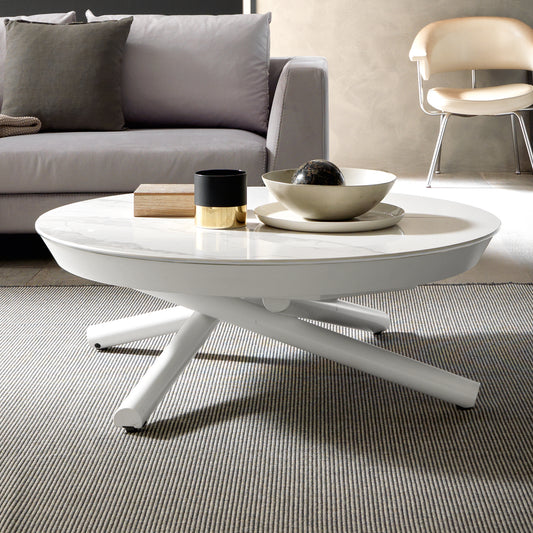 White Helios transforming coffee table by Altacom with marble-effect ceramic top and crossed metal base