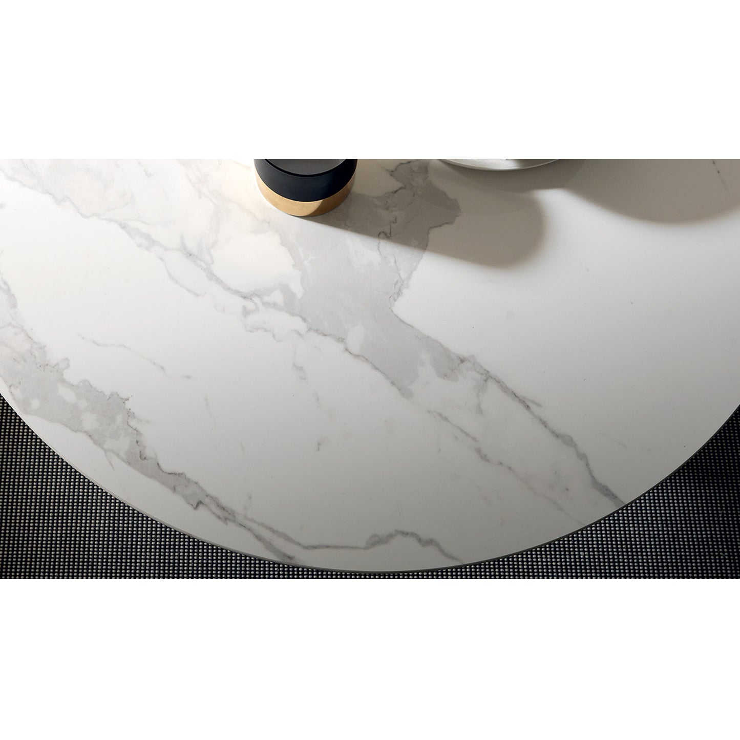 Close-up of Helios transforming table by Altacom with white marble-effect ceramic top and rounded edge
