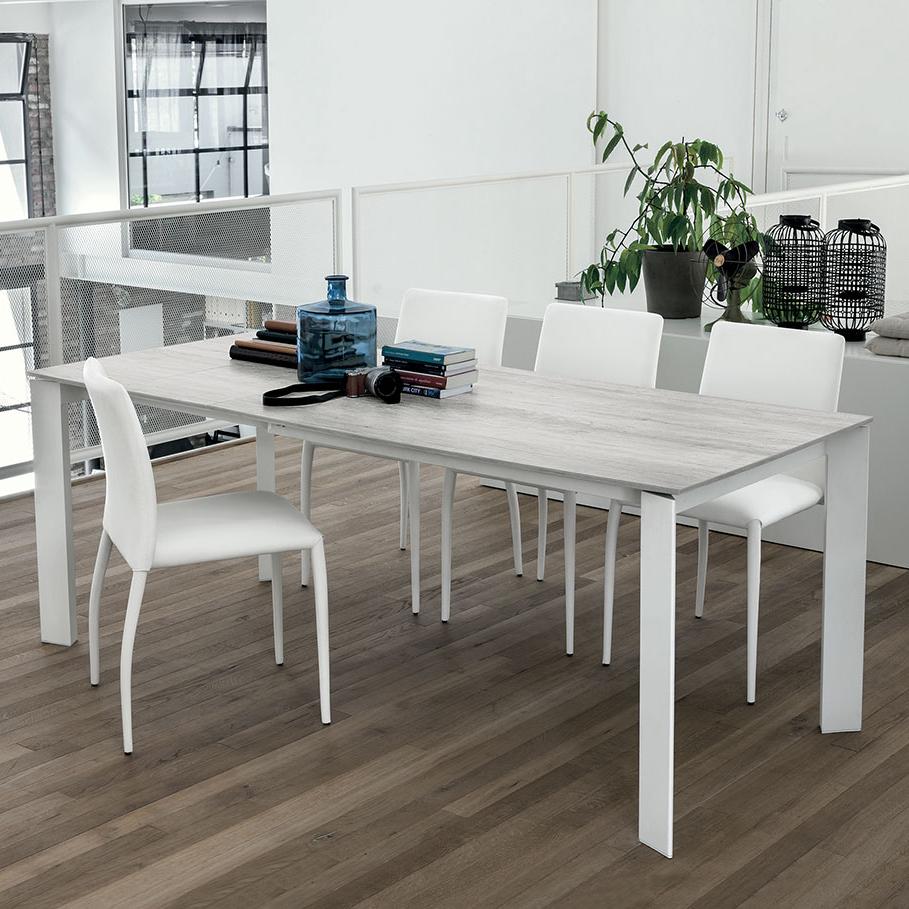 Saturno stoneware extending dining table by Target Point