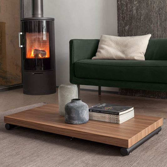 ultra low convertible coffee table with compact design and hidden wheels in modern living room