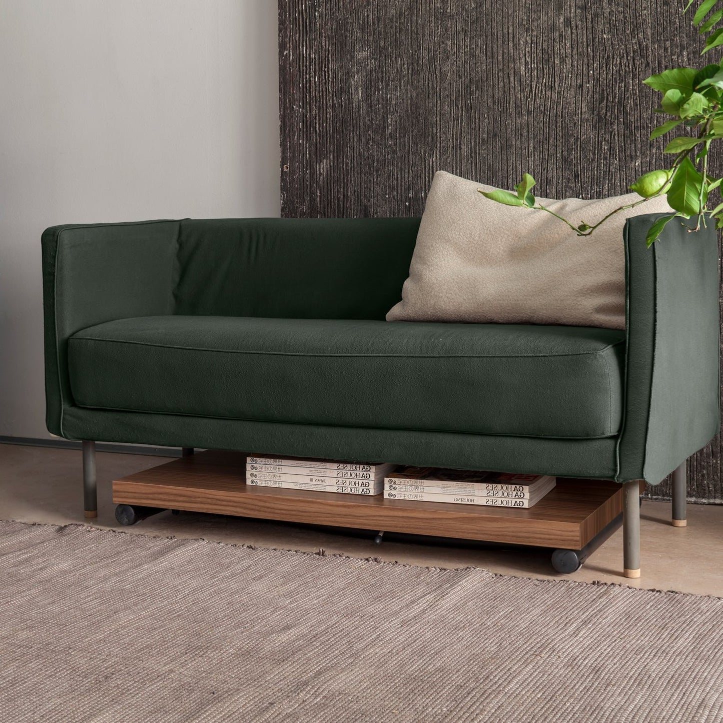 ultra low convertible table stored under sofa showing compact space saving design